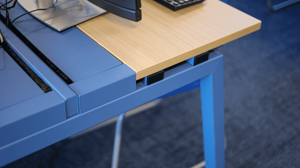 Sienna Evolution Bench Desk in the College's chosen Distant Blue metalwork colour option.